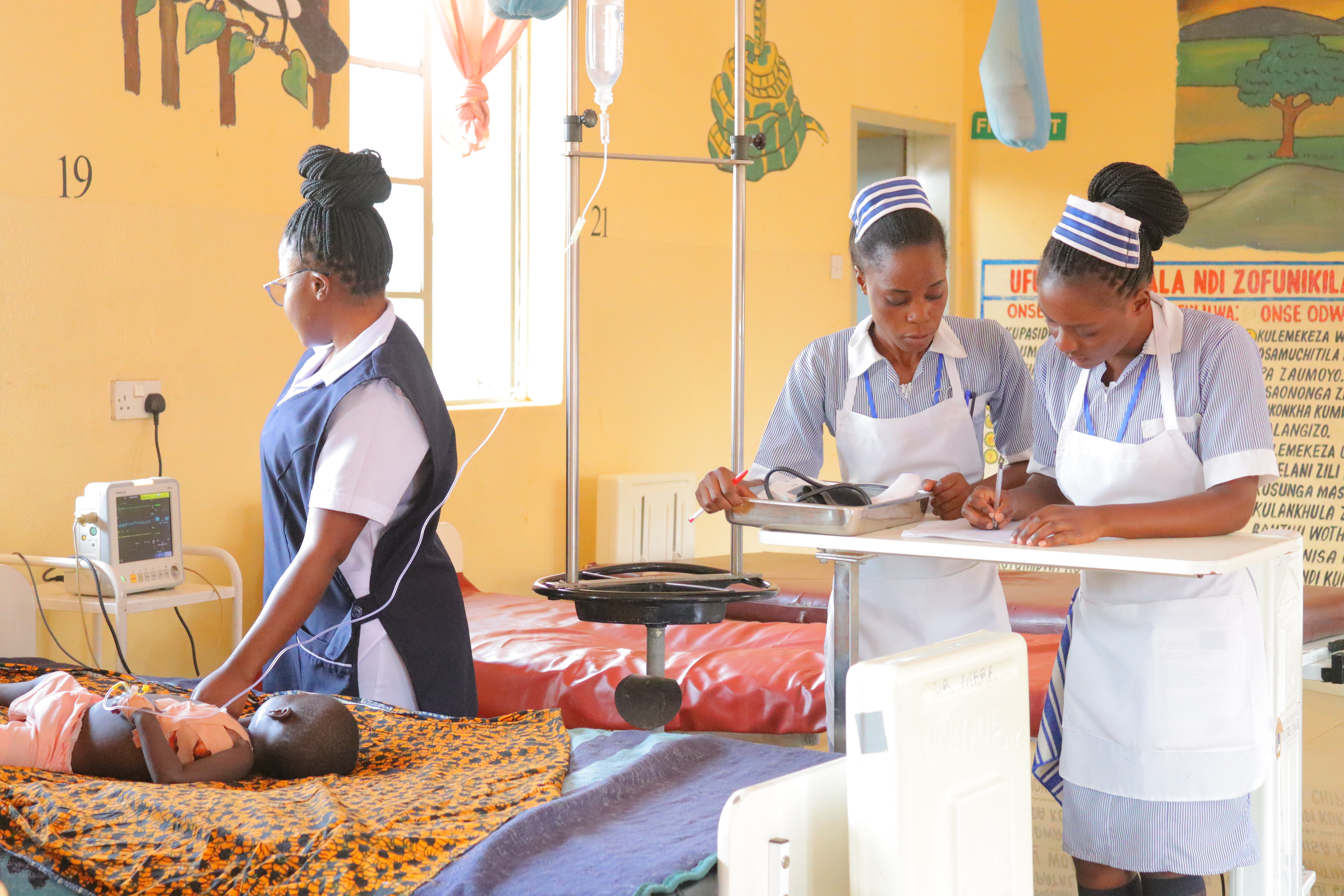 Nursing student practicing
